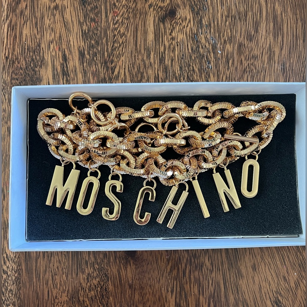 Authentic Moschino belt chain in gold color